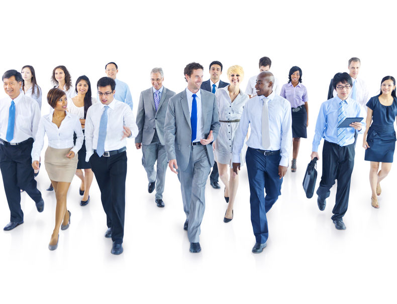 31335263 – business people walking toward camera alternate text for this image