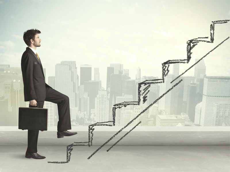Business man climbing up on hand drawn staircase job change promotion corporate ladder