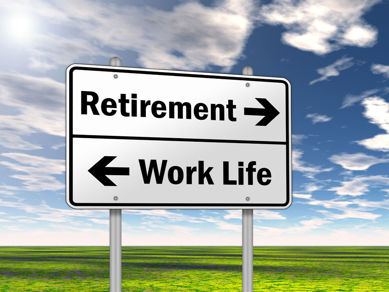 Retirement, work-life, sign post, direction on a field with blue sky