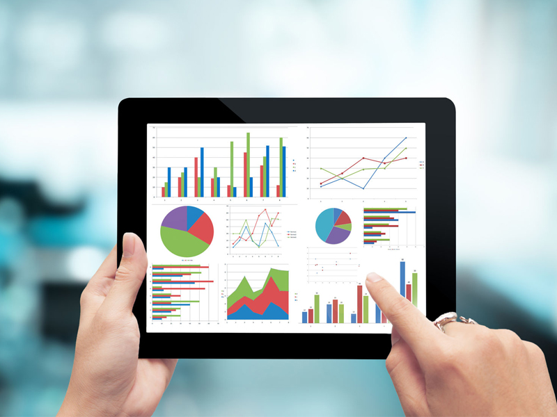 digital tablet hands graph planning economic business success