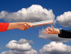 hands passing the baton, business succession theme