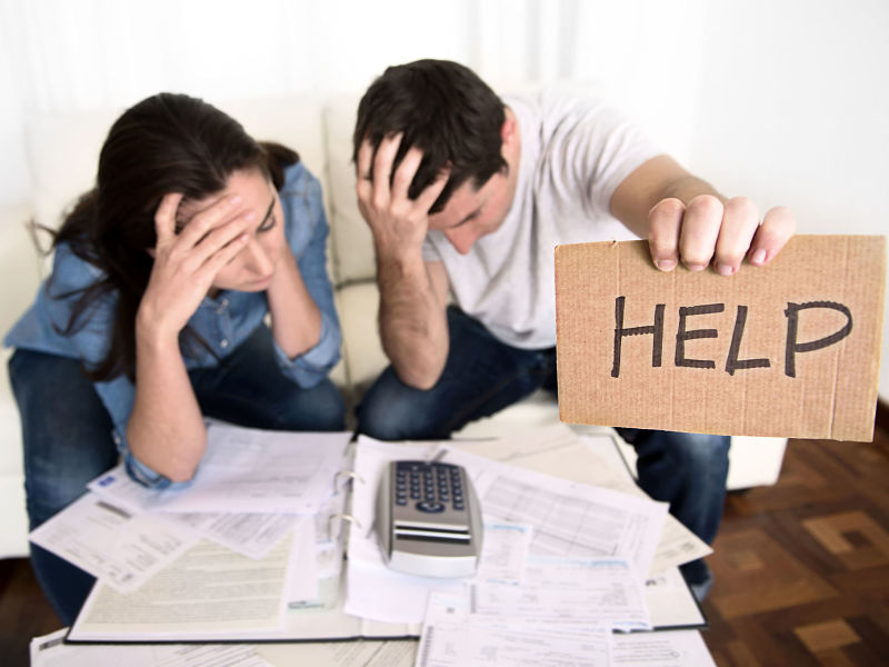 stressed young couple worries about their finances