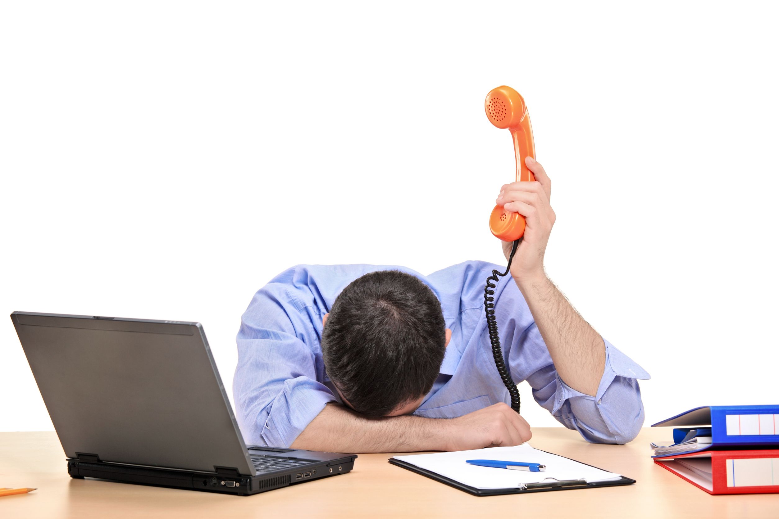 exhausted businessman holding a telephone