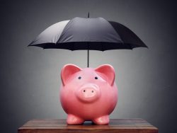 piggy bank with umbrella concept for finance insurance, protection