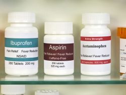 aspirin, ibuprofen, and acetaminophen in medicine cabinet.
