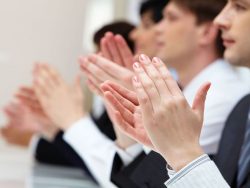 photo of business partners hands applauding