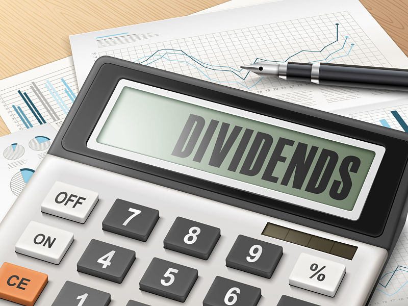 calculator with the word dividends on the display