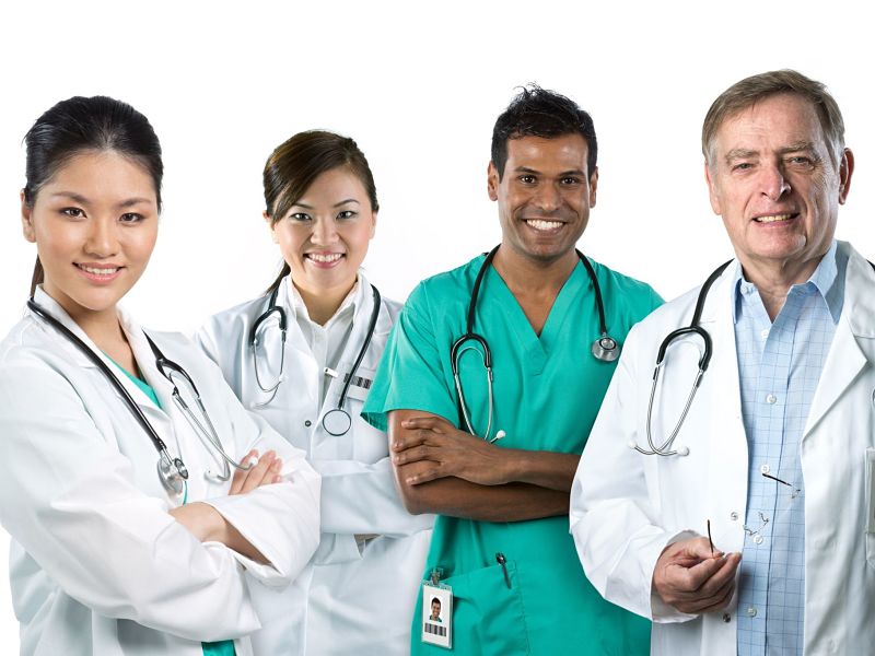 group image of a mixed race medical team. isolated on white.