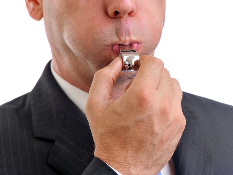 Businessman Blowing Whistle Isolated on White Background