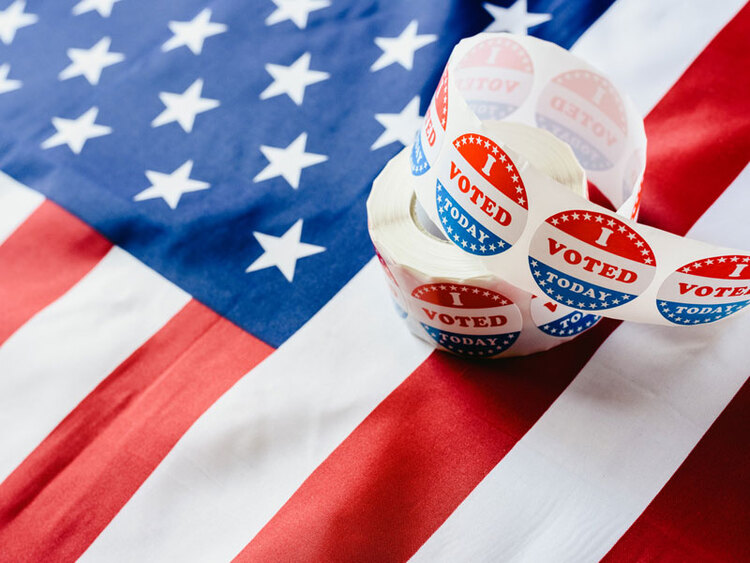 U.S. flag and voting stickers