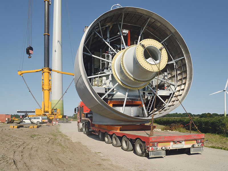 A truck transports a component of a wind turbine in Germany.
