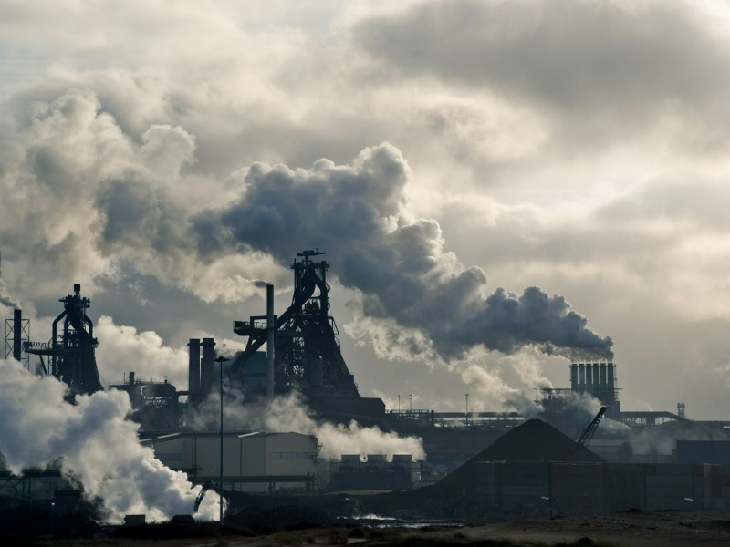 Lots of smoking chimneys in a dark environment