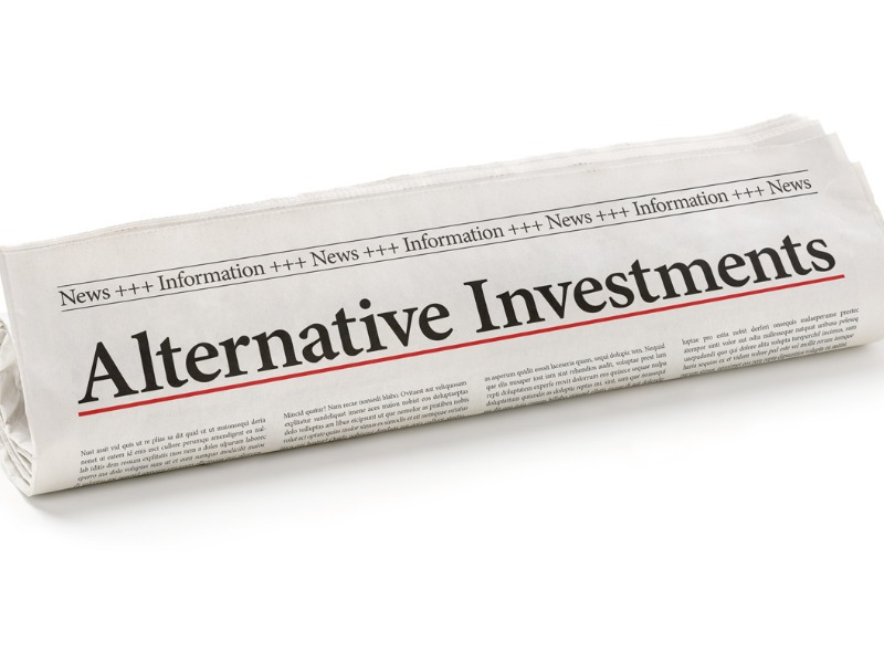 Rolled newspaper with the headline Alternative Investments