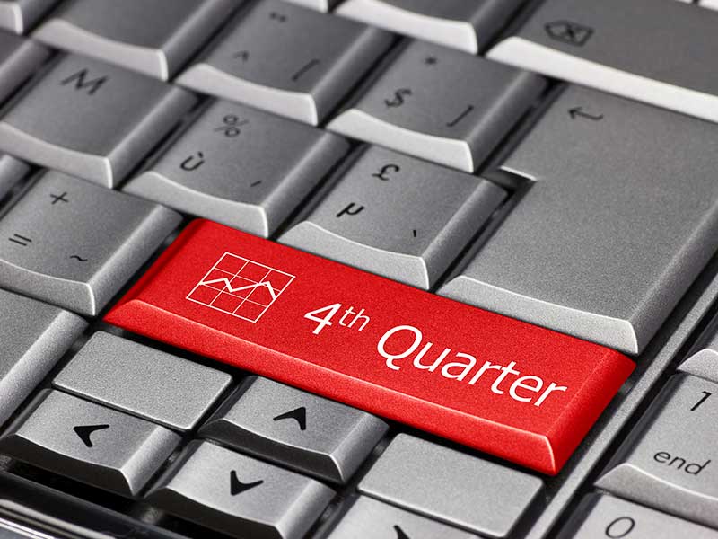 Keyboard with a large key that says "fourth quarter"