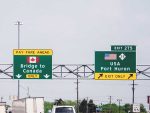 Photo of road signs of Bridge to Canada and USA Port Huron