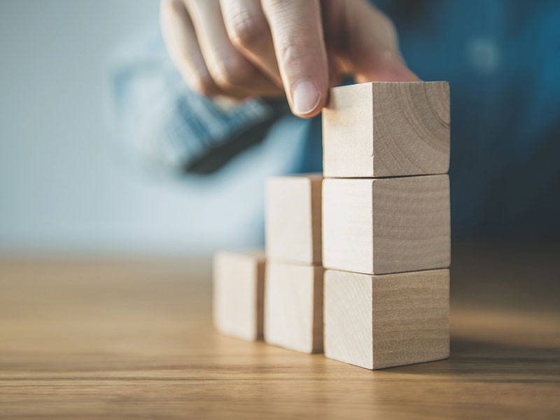 A man using building blocks