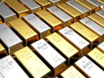 Rows of golden and silver bars stock photo