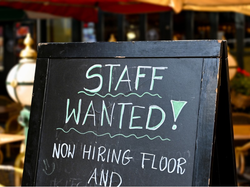 Staff wanted sign outside a restaurant stock photo