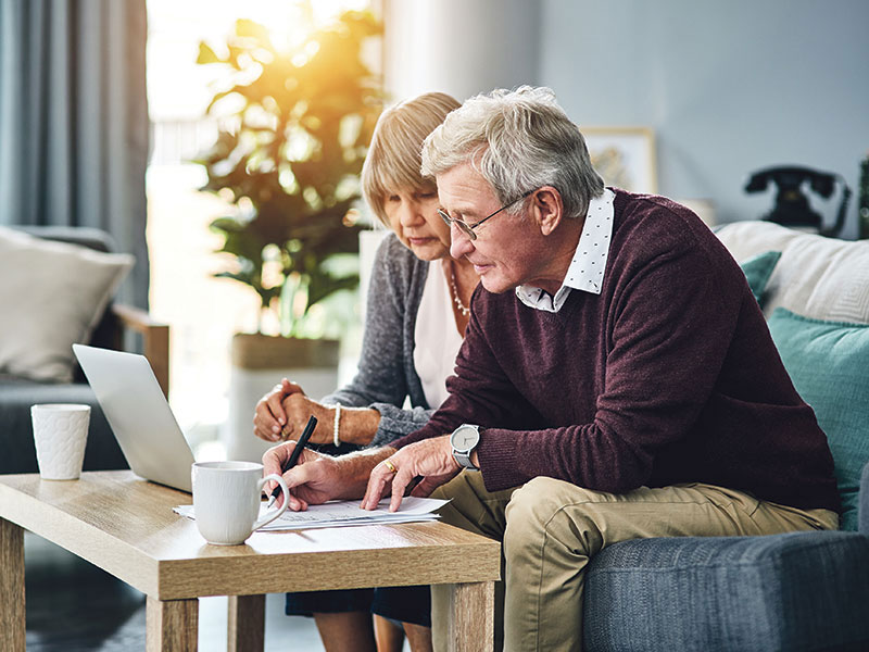 senior couple reviewing finances